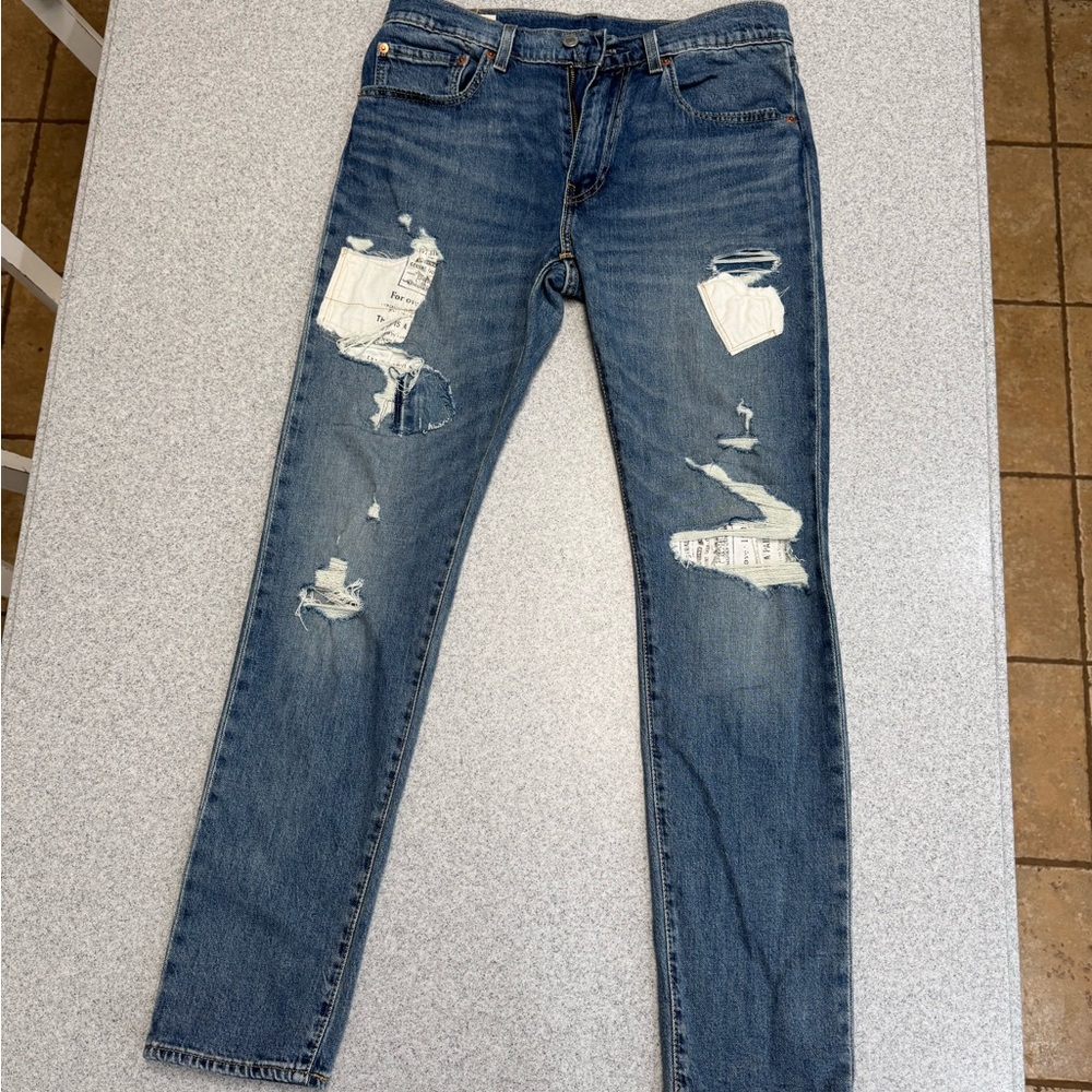 Levi’s Jeans 512 31x32 Patched distressed. Tapered Leg. upcycle redo boho style